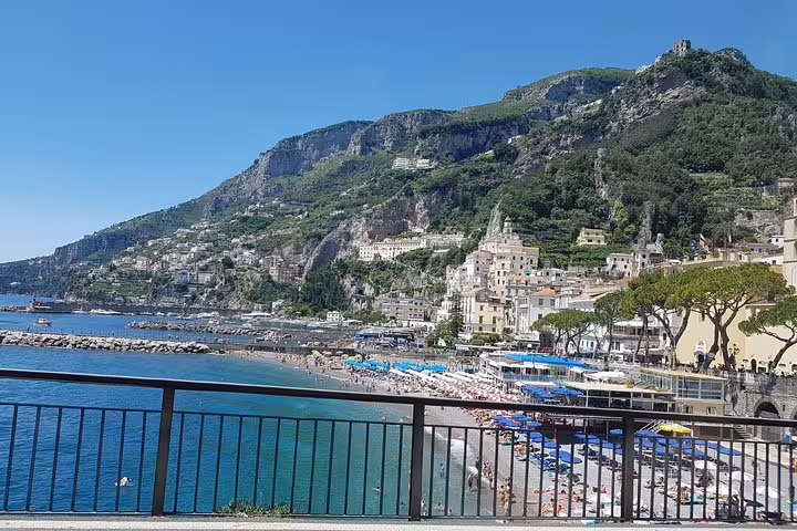 Panoramic Amalfi Coast beach and hillside town views on Sorrento and Positano day trip from Rome