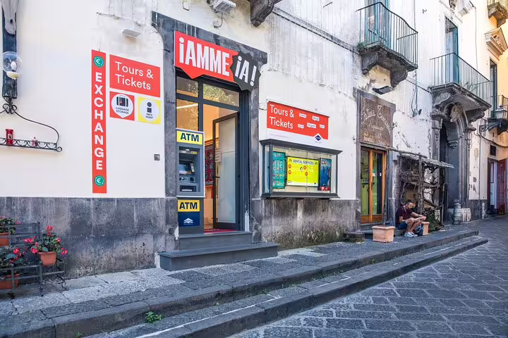 Entrance to a tour and ticket exchange shop in Sorrento, offering services for Amalfi Coast excursions.