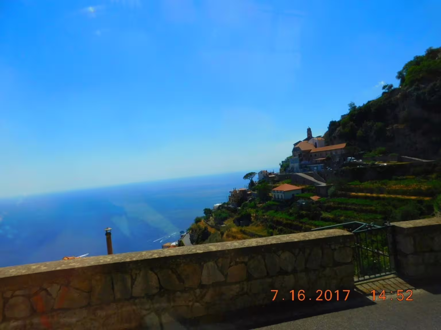Hillside village and coastline viewpoint on Amalfi Coast during Naples group tour with Pompeii visit