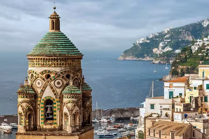 Stunning view of Amalfi's historic architecture and coastal scenery on an 8-hour local tour experience.