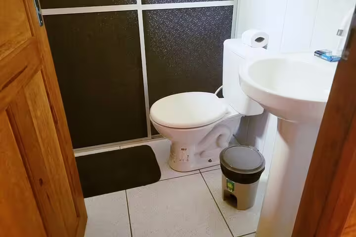 Well-maintained restroom at Amazon Tapiri Floating Lodge, offering essential amenities for guest convenience.