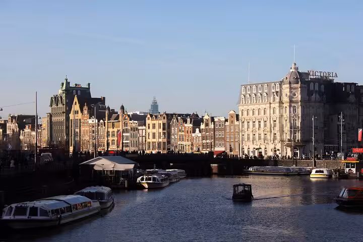 Amsterdam canal skyline near Centraal Station, ideal for a private city walking tour with a local guide