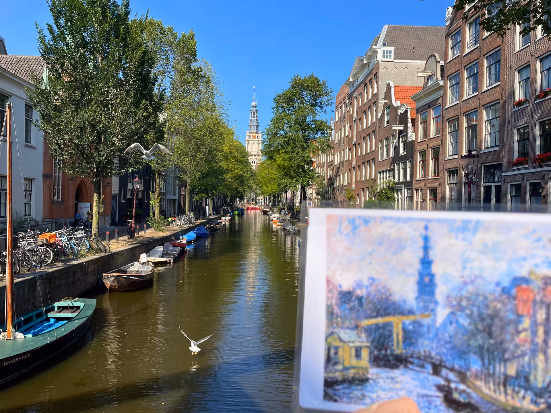 Amsterdam canal with boats and Westerkerk tower, scene from Rembrandt & Van Gogh walking tour with art print