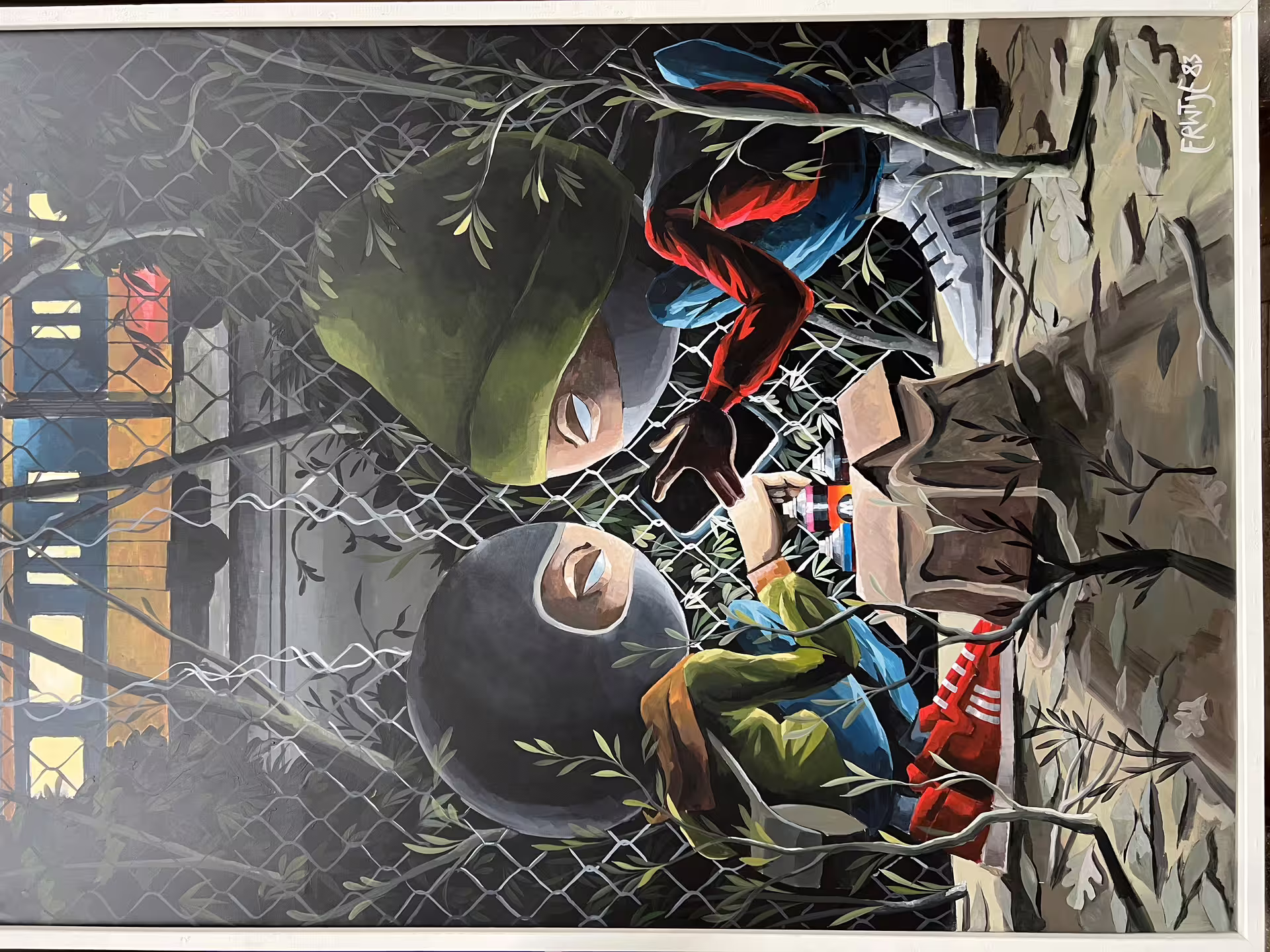 Colorful street art mural in Amsterdam's NDSM, featuring two hooded figures interacting through a fence, highlighting urban creativity.