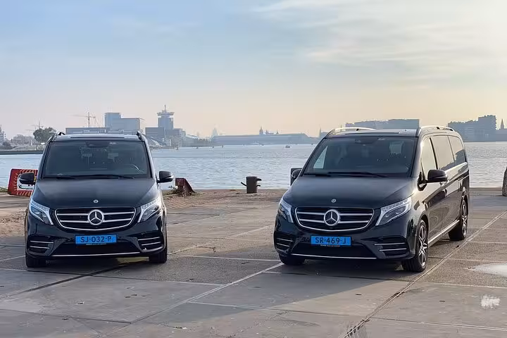 Luxury Mercedes van private transfer from Amsterdam to Schiphol Airport, comfortable door-to-door service