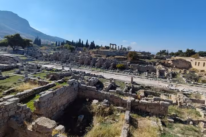 Panoramic view of Ancient Corinth excavations and temple remains, Biblical Corinth tour with Greek wine and olive oil tasting