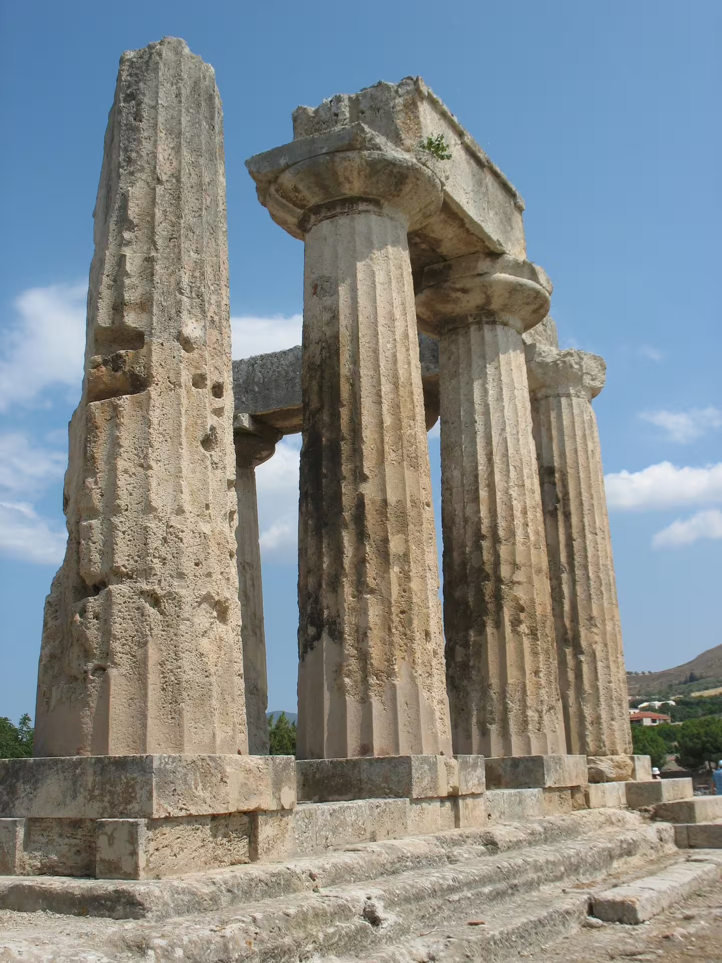 Ancient Corinth Temple of Apollo columns on a private day tour from Athens to Corinth and Isthmus Canal