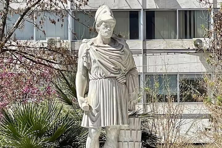Statue of ancient Greek philosopher in Athens city center, part of a 2-hour private express highlights tour