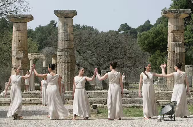 Traditional reenactment at Ancient Olympia ruins on private day tour from Athens, Greece highlights