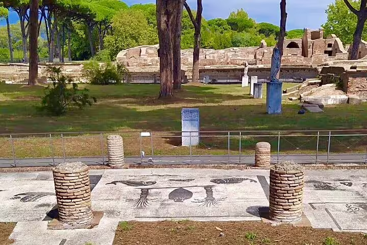 Ancient Ostia Antica ruins and mosaic floor seen on guided archaeological tour from Rome with river cruise tickets