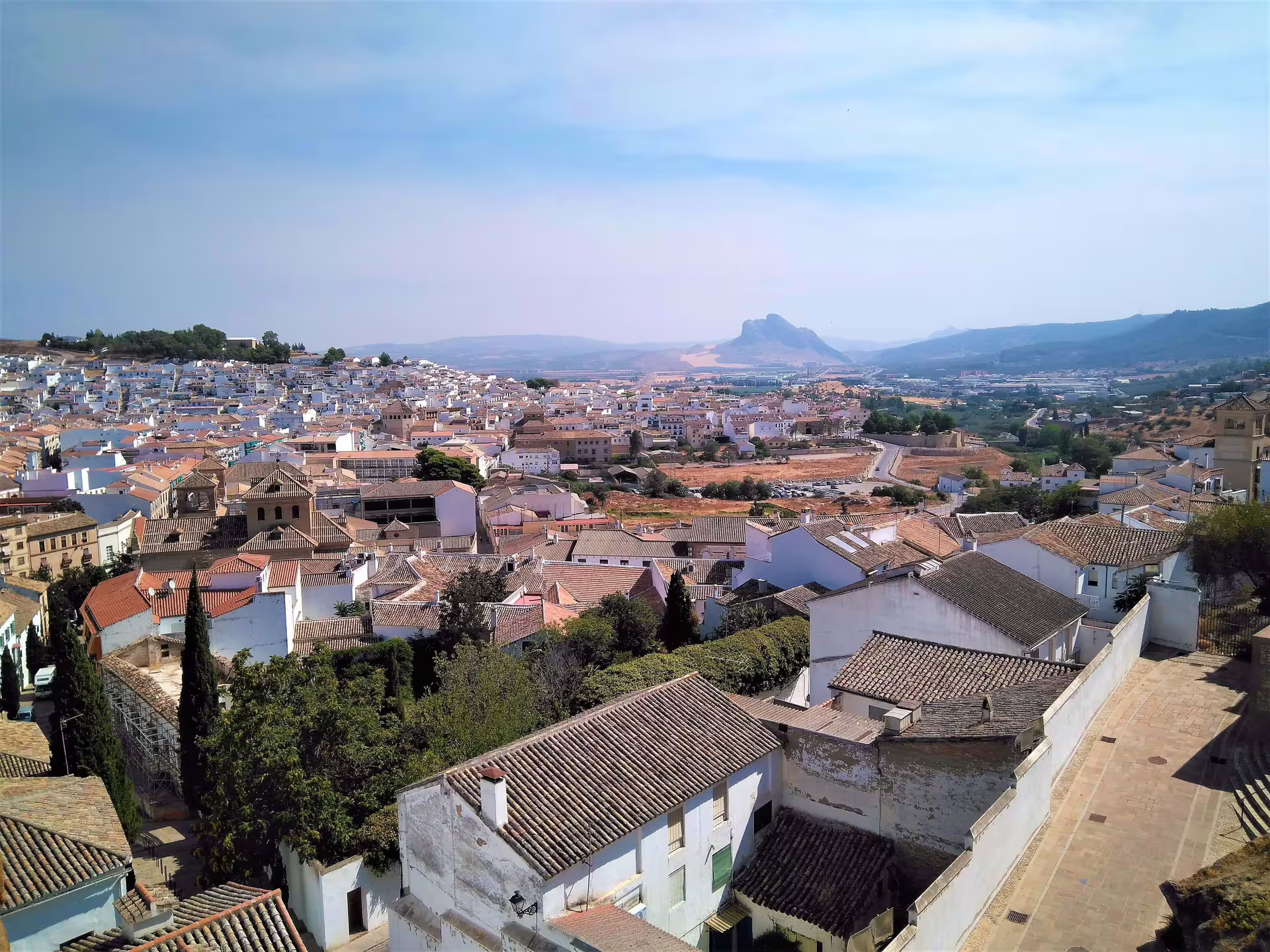 Panoramic view over Antequera whitewashed rooftops and countryside on a private day tour from Costa del Sol