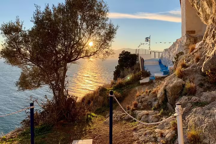 Sunset view over the Aegean Sea from rocky coastal path near Athens on Apostle Paul’s footsteps half-day tour