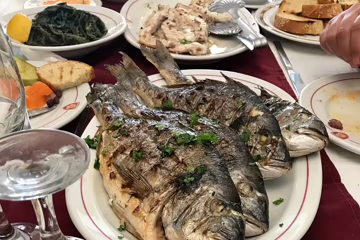 Greek seafood lunch with grilled fish during Apostle Paul’s Footsteps half-day private tour from Athens
