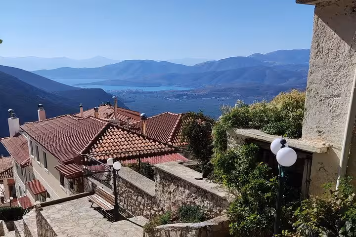 Panoramic Arachova rooftops overlooking Parnassus valley, scenic stop on Mystical Delphi luxury day tour