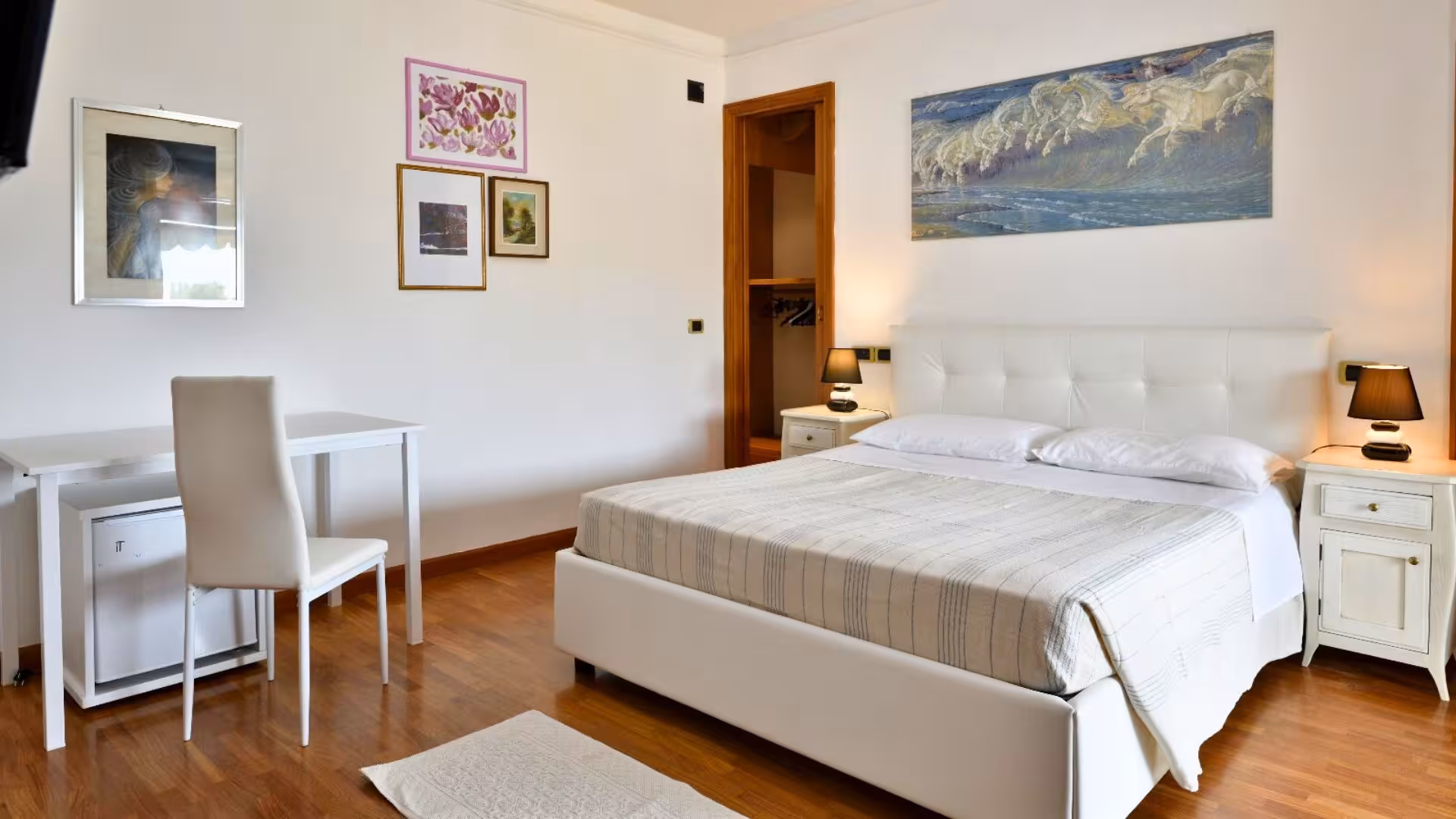 Cozy Arbatax room with modern decor, ideal retreat during the 7-day Selvaggio Blu hiking adventure.