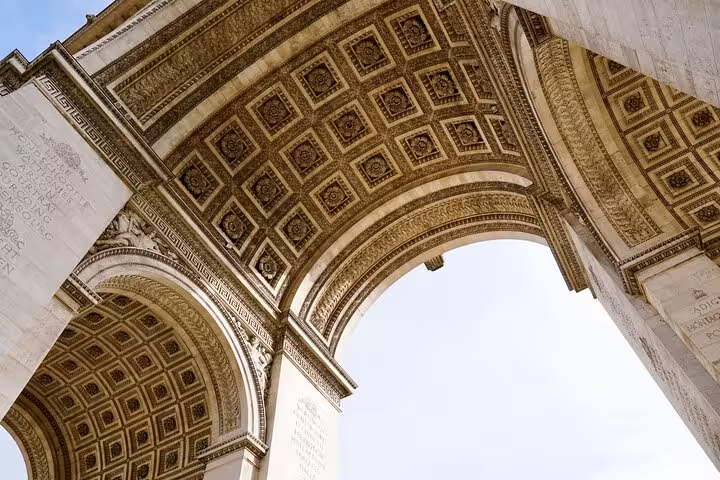 Close-up view under the Arc de Triomphe arch ceiling on a private Paris tour near Champs-Élysées
