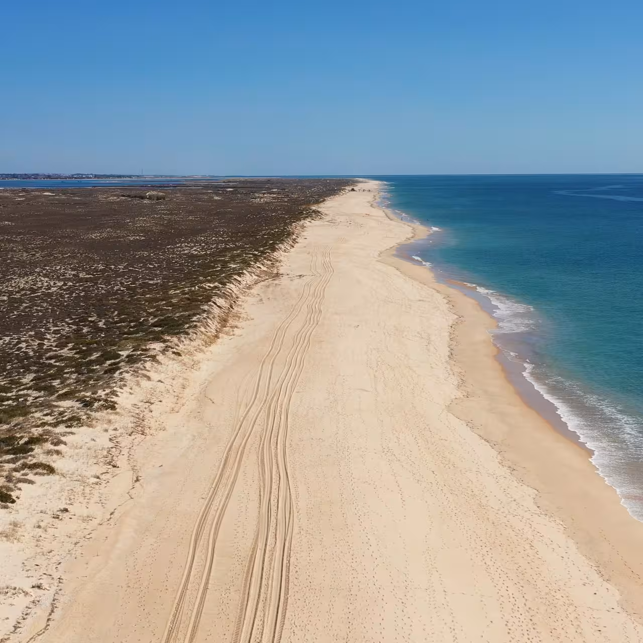 Aerial view of Armona Island beach and turquoise Atlantic on the From Olhão Armona and Culatra boat tour