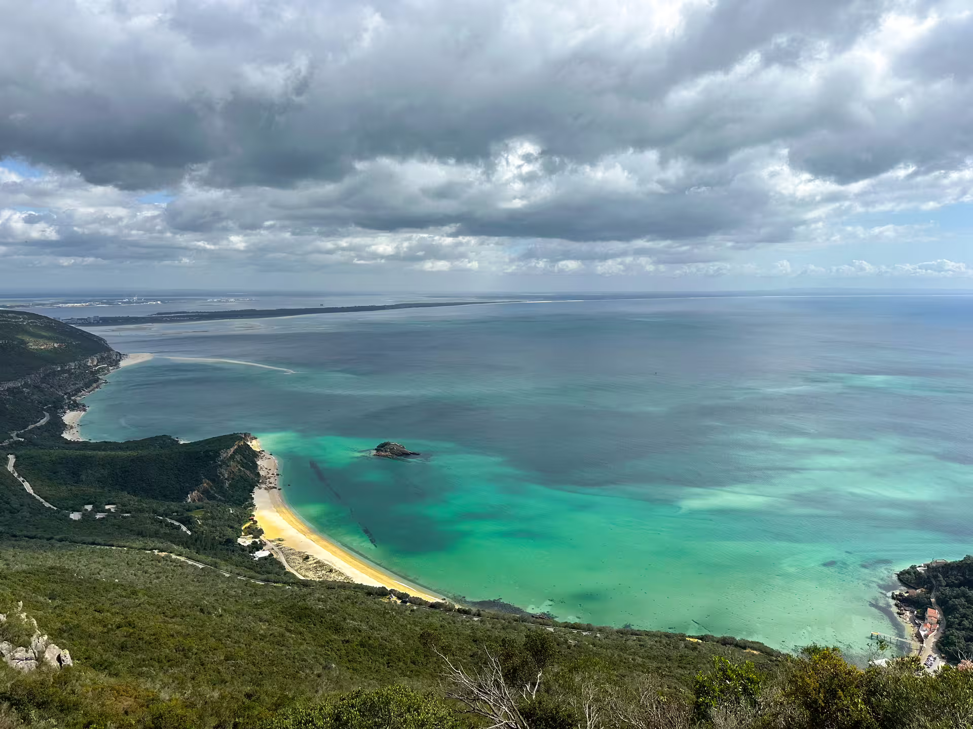 Discover breathtaking coastal views of turquoise waters and sandy beaches on the Arrábida and Setúbal tour.