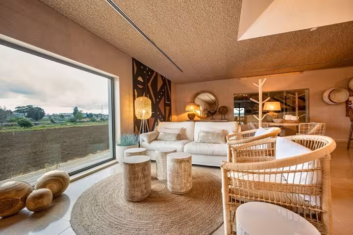 Cozy lounge with rustic decor in a vineyard setting on the Arrábida and Comporta wine tour from Lisbon.