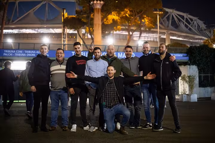 Local guide and fans outside Stadio Olimpico before AS Roma or Lazio matchday experience in Rome