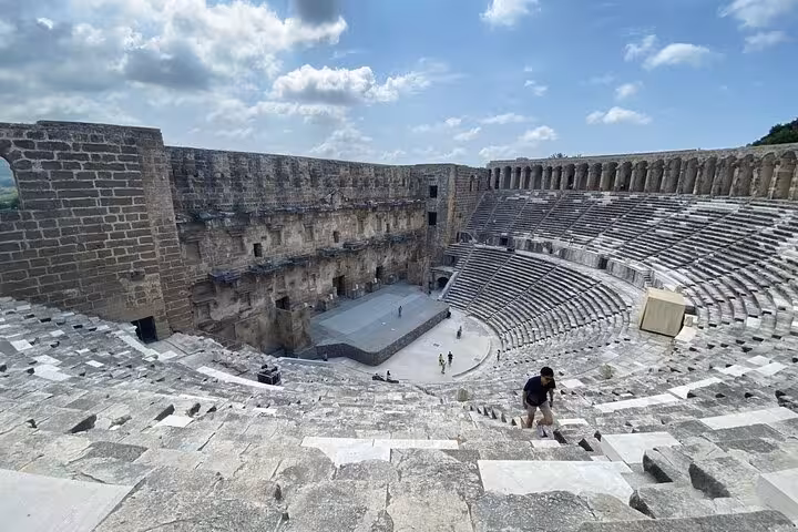 Panoramic view of Aspendos Roman Theatre seating and stage, highlight stop on Aspendos Perge Side guided tour