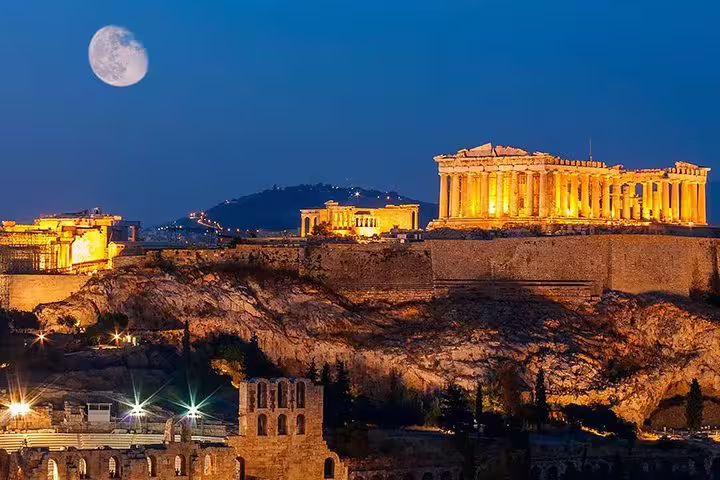 Illuminated Acropolis and Parthenon under the moon on an Athens night tour, Greece city skyline views