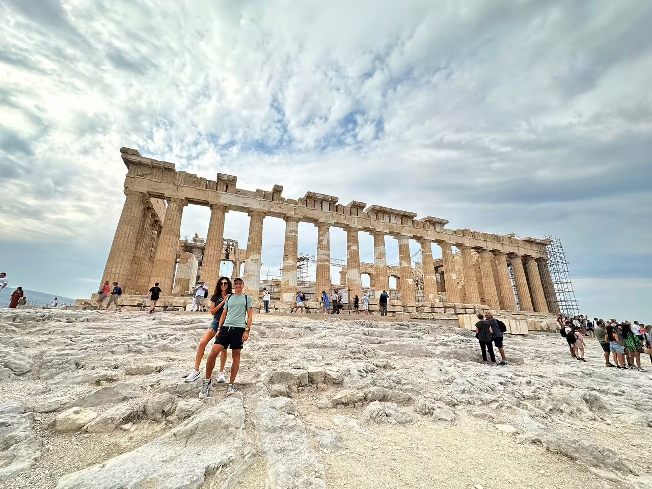 Parthenon on the Acropolis in Athens with visitors, featured on a small-group sightseeing tour with tickets included