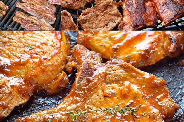 Traditional Greek dinner in Athens with grilled meats and glazed pork steaks, included on afternoon tour