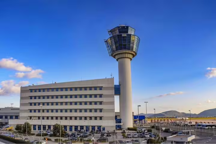 Athens International Airport control tower, meeting point for private arrival transfer to Athens city center