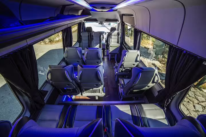 Luxury minibus interior for Athens airport to Lavrio port private transfer with spacious seats and AC