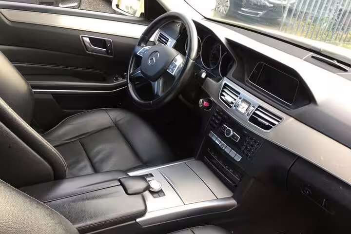 Premium limousine interior for Athens Airport to Plaka and Monastiraki transfer with private chauffeur service