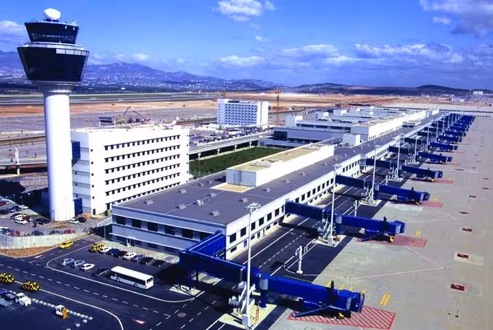 Aerial view of Athens International Airport terminal, meet-and-greet luxury private transfer to Athens hotels