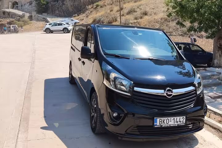 Black luxury van for Athens Airport to Piraeus Port private transfer, premium hotel pickup in Athens