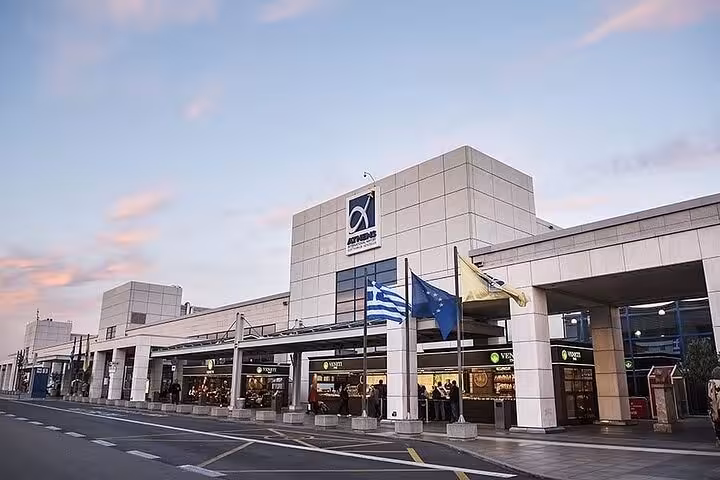 Exterior of Athens International Airport terminal, pickup point for luxury private transfer service to Athens hotels