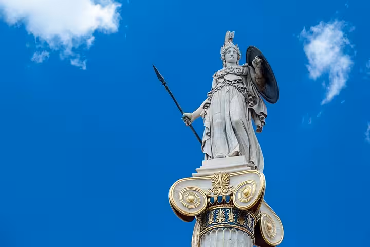 Athena statue at Academy of Athens, a top stop on Athens airport transfer with express city highlights