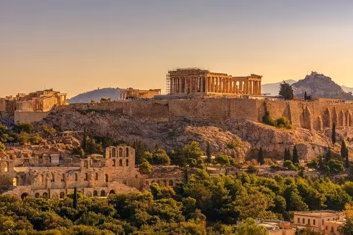 Sunset view of the Acropolis and Parthenon on Athens airport transfer with express city highlights tour