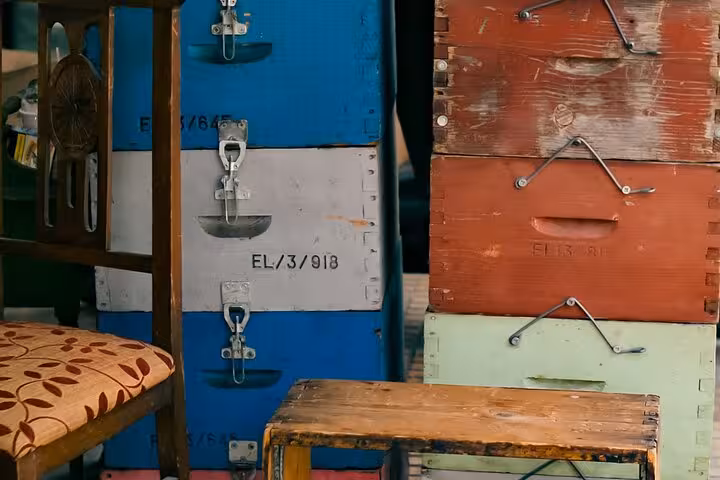 Colorful wooden beehives at Athens market stop on small group walk and taste tour for cruise ship travelers