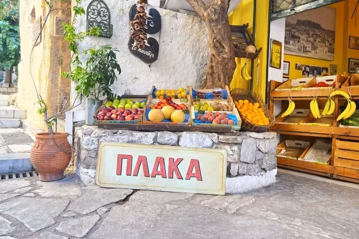 Explore Plaka's vibrant fruit market with fresh produce on our Athens food tour for an authentic local experience.