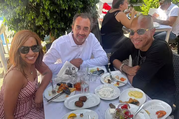 Guests enjoying Greek meze at an Athens taverna during a Best of Athens half day private tour