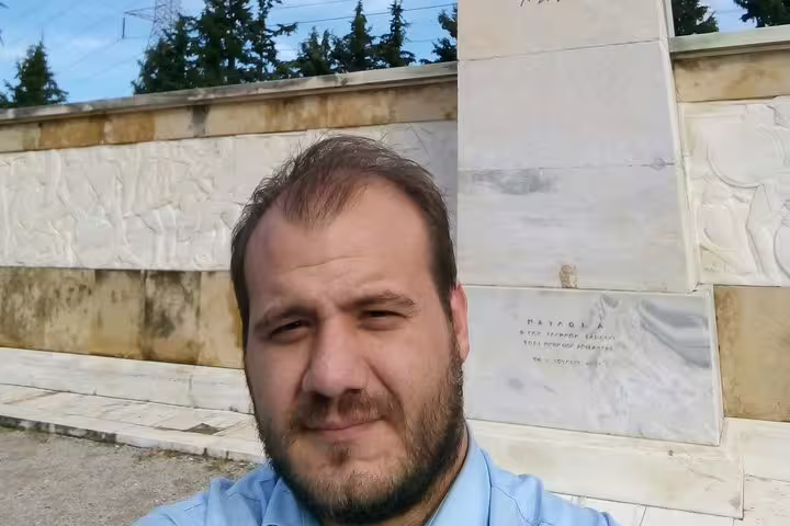 Driver selfie at Athens pickup point for private transfer to Lefkada, Greece with comfortable door-to-door service