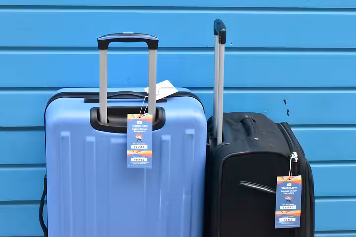 Suitcases with Stasher tags for secure Athens luggage storage near Acropolis Museum bag drop