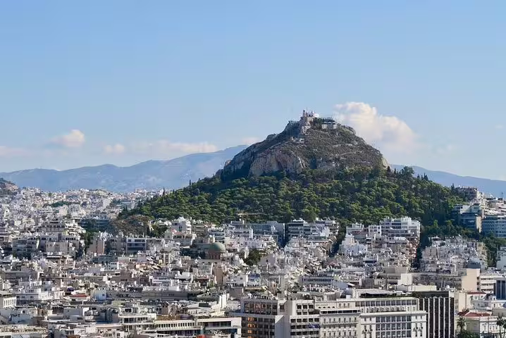 Athens city skyline with Lycabettus Hill, ideal viewpoint on a private layover tour from airport or port