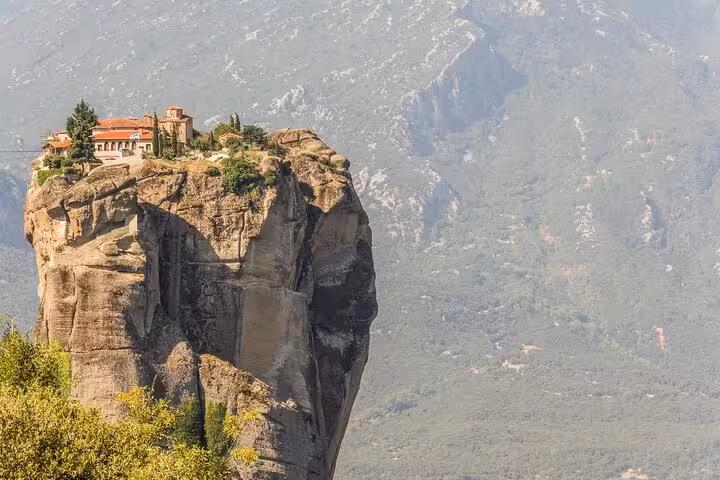 Monastery perched atop a Meteora sandstone pillar, scenic stop on Athens to Meteora private day trip