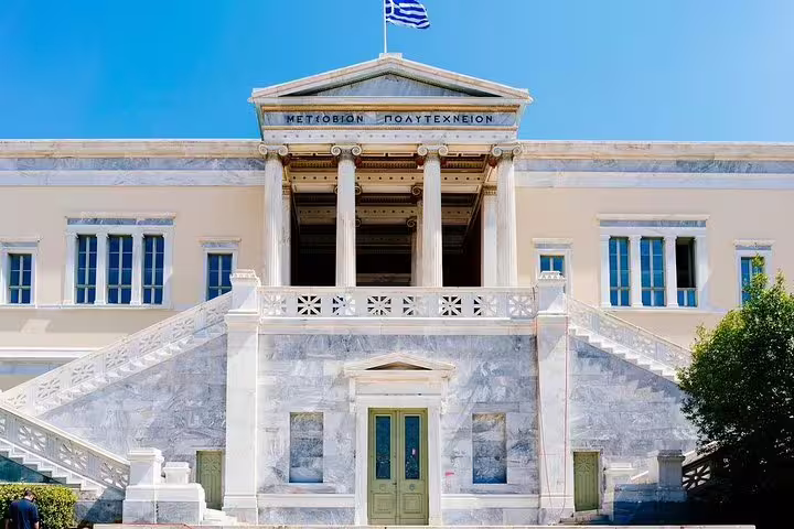 Athens National Technical University neoclassical facade on an afternoon sightseeing tour ending with Greek dinner