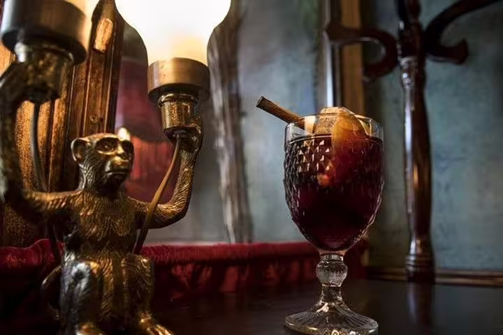 Close-up of spiced wine cocktail in an Athens bar, part of Athens by night tour with drinks and food tasting