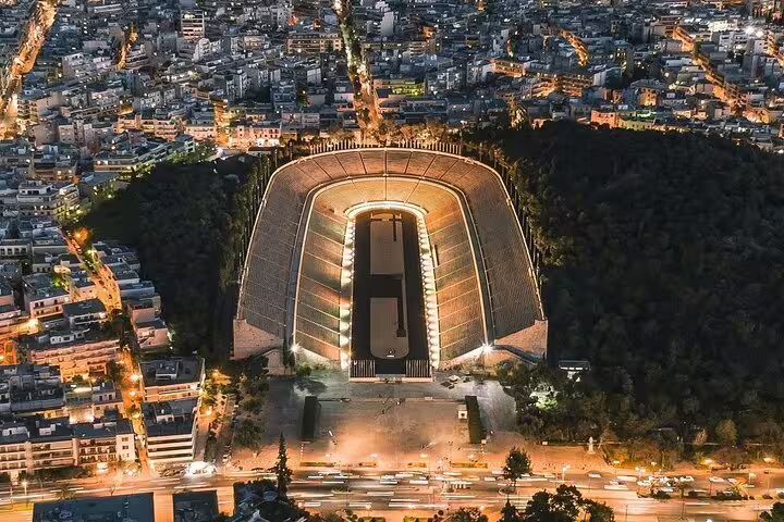 Panathenaic Stadium aerial view at night in Athens, landmark near Athens center to Piraeus port transfer