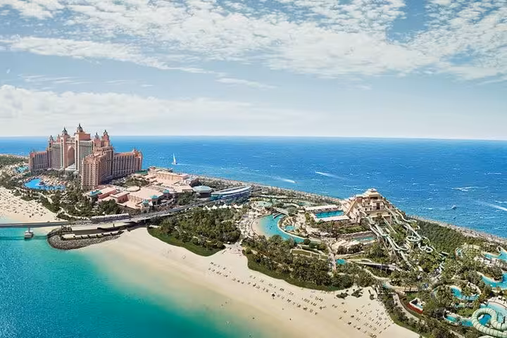 Aerial view of Atlantis Aquaventure Waterpark Dubai with Palm Jumeirah beach, slides and Arabian Gulf