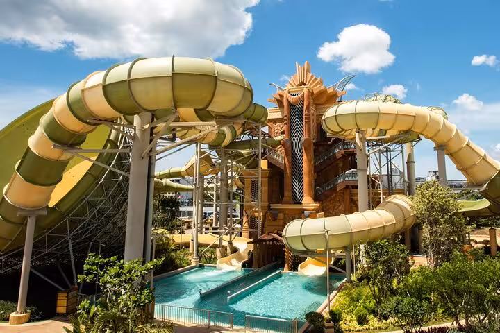 Thrill water slides at Atlantis Aquaventure Waterpark Dubai with splash pool, perfect for day pass visitors