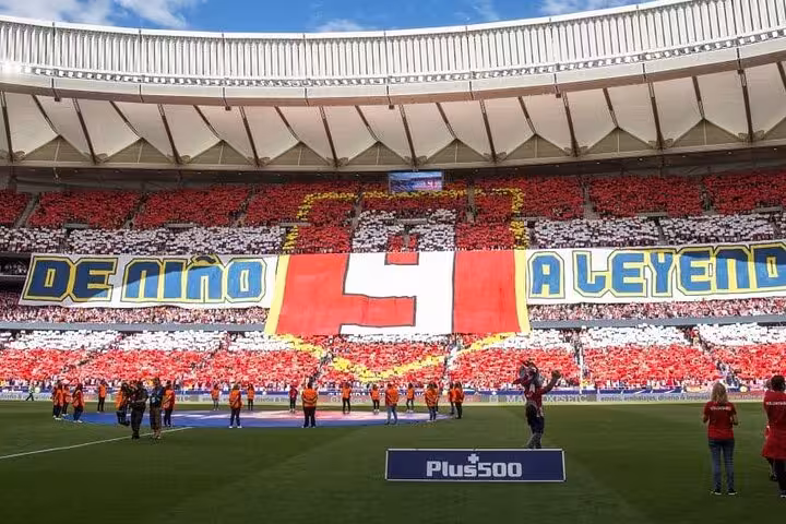 Atletico Madrid fans display red-white tifo at Civitas Metropolitano on matchday with local host