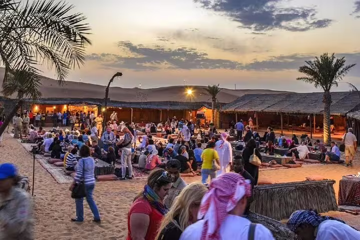 Crowded Bedouin camp dinner and desert show in Sharm El Sheikh, a stop after ATV quad bike and camel ride